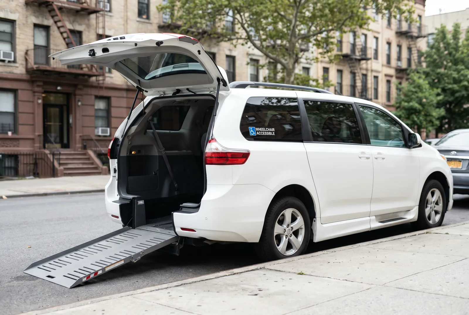 Sienna with the rear ramp deployed on a Bronx street